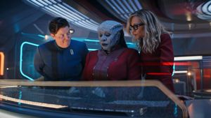 Much to the consternation of a bunch of racist shitheads, three fabulously cool and competent women — Lieutenant Rork, Lieutenant Commander Lura Thok and Captain Nahla Ake — are at a console on the bridge of the USS Athena, discussing some kind of subspace instability.
