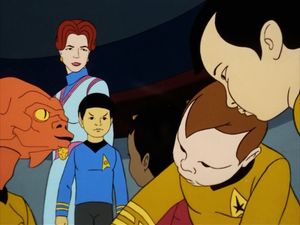 On the bridge of the Enterprise an elegant woman is looking down at a group of toddlers, including Kirk, Spock, Uhura, Sulu and Arex.