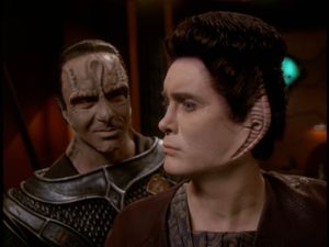 In a control room on Cardassia, Weyoun is looking off into the distance, as if contemplating a terrible thing he's just been persuaded to do. Damar is behind him, smiling.